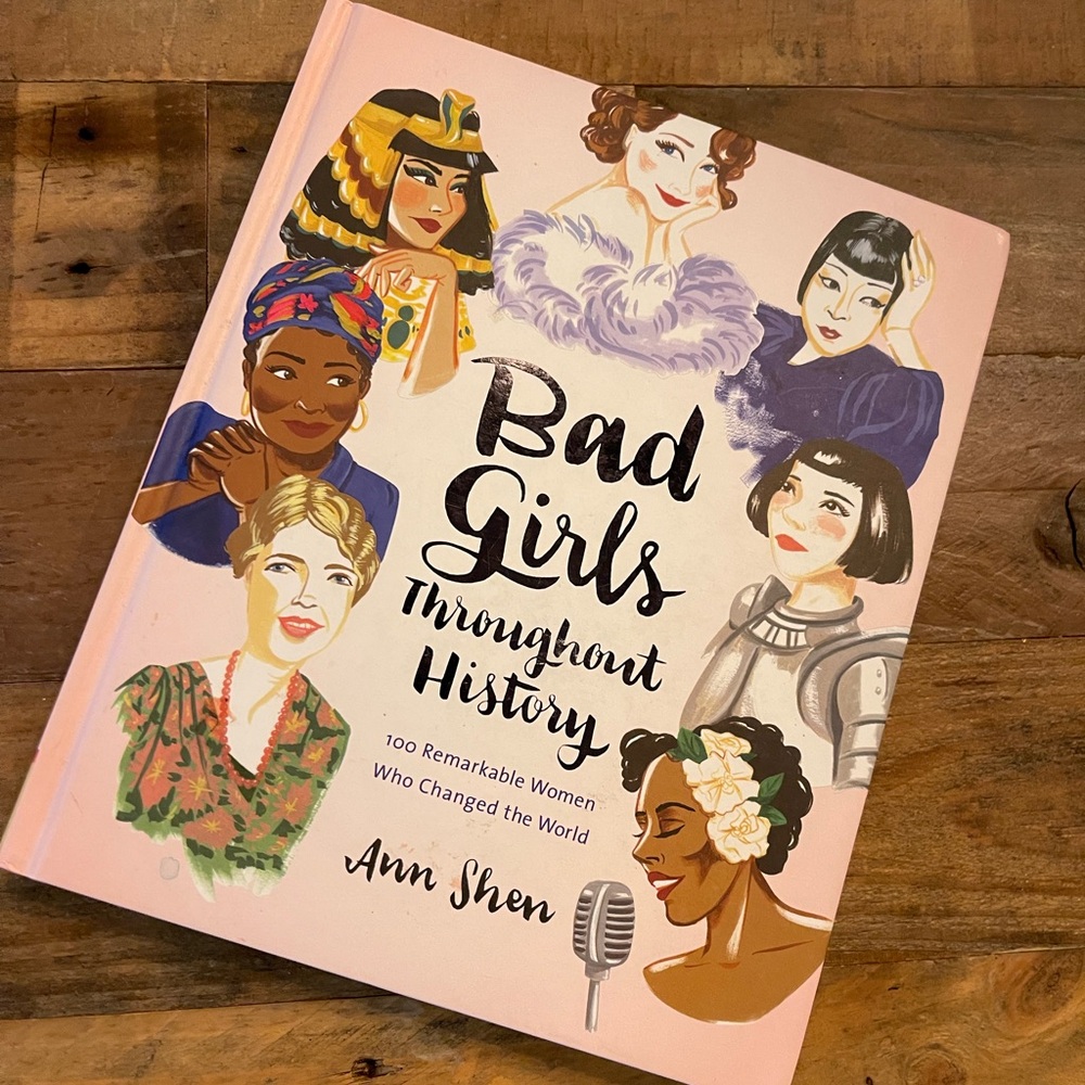 Hard cover book of 100 revolutionary woman
